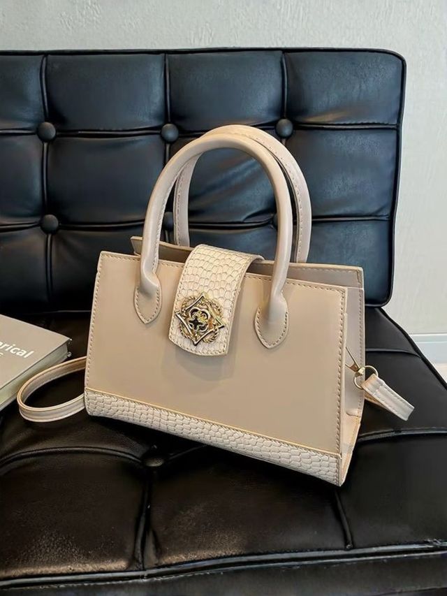 Elegant Structured Handbag with Detachable Sling Strap